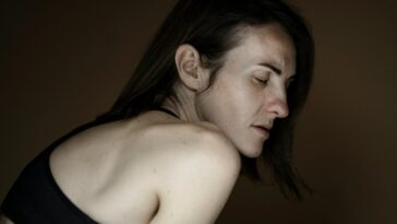 woman in black tank top