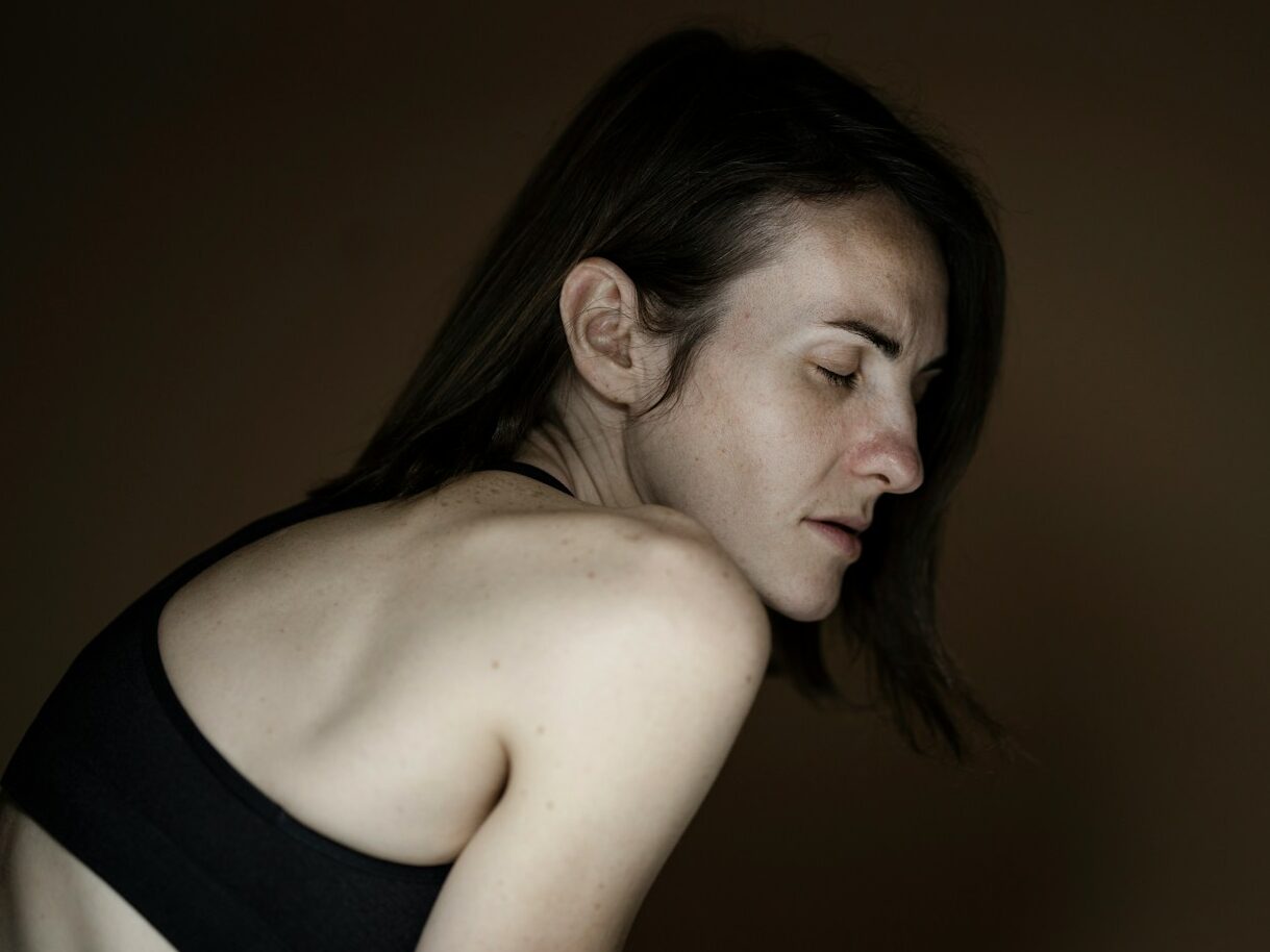 woman in black tank top