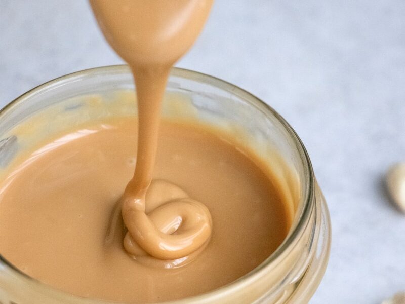 clear glass jar with brown liquid