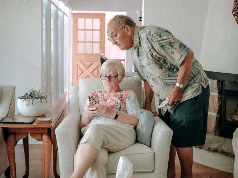 a woman and a man in a living room