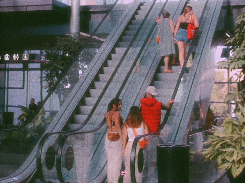 people walking up a flight of stairs