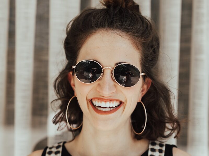 woman wearing white and black rompers and black top
