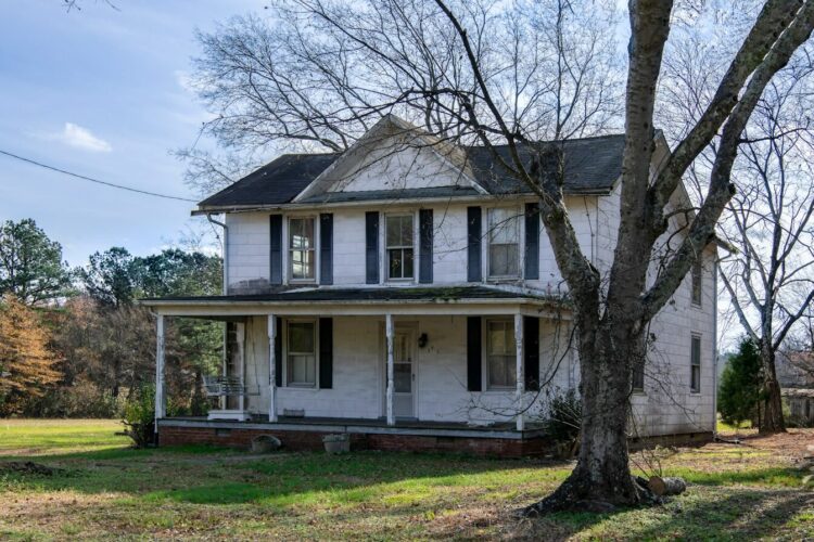 white and gray 2 storey house