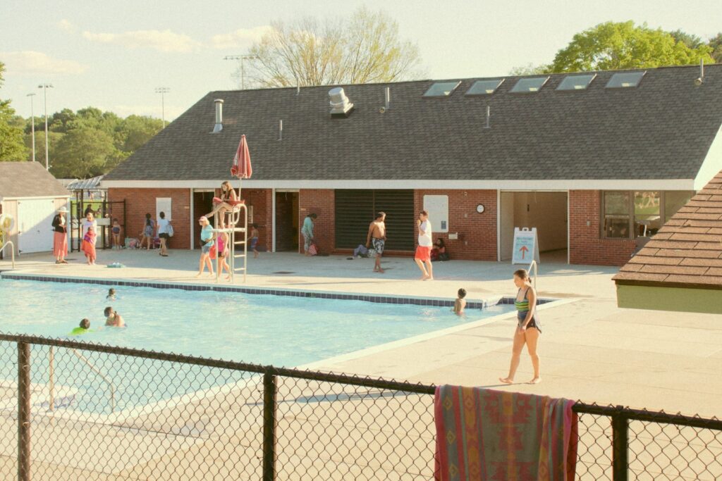 people in swimming pool during daytime