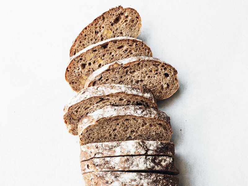 sliced breads on white surface