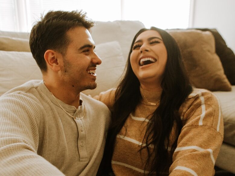 a man and woman laughing